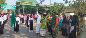 Babinsa Kejagan Koramil Trowulan Berangkatkan Pawai Ta’aruf Santri Ke-13 TPQ Bustanul Huda