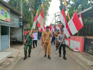 Tiga Pilar Desa Bersama Tokoh Lintas Sektor Kibarkan Serentak Merah Putih di Desa Bejijong