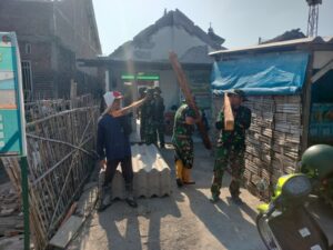 Satgas TMMD ke-126 Kodim 0815/Mojokerto Tetap Semangat di Hari Libur, Pekerjaan Sasaran Fisik Terus Dikebut