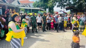 Satgas TMMD ke-126 Kodim 0815/Mojokerto Laksanakan Pengamanan Festival Pesta Rakyat di Desa Sumbertanggul